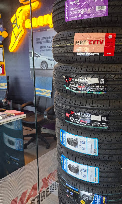 Fouji Tyres tyre display with branded stock